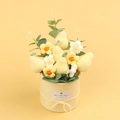 Close-up of handmade knitted pear flower pot with Best wishes label in gift box - Pear Style Gift Bucket