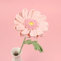Handmade crochet pink gerbera daisy flower in white ceramic vase on pink background - With Vase / Pink