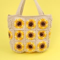 Handmade crochet tote bag with 3D sunflower pattern on a solid yellow background - Beige Sunflower