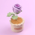 Handmade crochet purple rose in a cream knitted pot with handmade leather label - Purple
