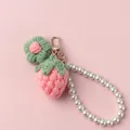 Pink handmade crochet strawberry keychain with white pearl strap and gold clasp - Pink Strawberry + Puff Flower + Pearl Chain / Pink