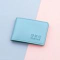 Light blue faux leather vehicle license holder with elegant embossed texture and stitching - Holographic Blue