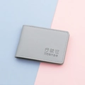 Grey leather driver's license holder with detailed texture and embossed lettering - Gray