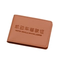 Brown litchi grain leather driving license holder with precise stitching detail - Brown
