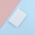 Slim white leather minimalist card holder wallet with elegant stitching on dual color background - White