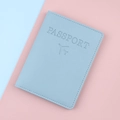 Light blue RFID passport holder in PU leather with embossed lettering and plane icon - Blue