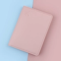 Pink minimalist faux leather passport holder cover with debossed airplane logo - True Powder