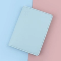 Light blue faux leather passport holder with embossed airplane icon and neat stitching - Ice Blue