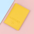 Vibrant yellow faux leather passport cover with embossed airplane icon and text - Bright Yellow