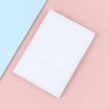 White textured PU leather passport cover with embossed lettering and aircraft design - White