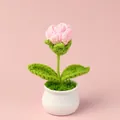 Close-up of hand-crocheted pink tulip in a white ceramic pot with soft texture - Pink Rose Potted Plant