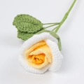 Macro detail of hand-crocheted white and yellow gradient rose flower with green leaves - Gradient Yellow