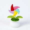 Macro detail of handmade crochet pinwheel plant with colorful petals and ceramic pot - Purple Windmill Potted Plant (Double Leaf)