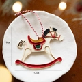 Vintage style Christmas rocking horse ornament in cream and red with rustic finish - White Rocking Horse