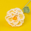 Detail of hand-knitted gradient yellow peony with crochet petals and leaf texture - Yellow