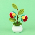 Handmade crochet watermelon potted plant ornament with green leaves and a white ceramic base - Watermelon Style Potted Plant (Moe Doll)