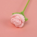 Close-up of handmade pink crochet bubble rose showing delicate wool texture and layers - Flesh Pink