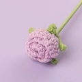 Macro detail of a handmade crochet purple rose with textured petals and green stem - 3cm Flower Head / Purple