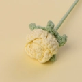 Detailed knit texture of a handmade yellow crochet rose with green stem for gifting - 3cm Flower Head / Yellow
