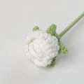 Close-up of handmade white crochet rose with green stem showing knitted texture details - 3cm Flower Head / White