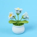 Handmade crochet Lily of the Valley flower in white and blue in a white ceramic pot - Light Blue