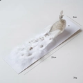 White faux peacock ornament with silver sequins and white feathers for Christmas tree decoration - White Peacock