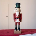 Figurine casse-noisette de Noël en uniforme rouge mesurant 21 cm sur un socle rouge - Soldat Rouge