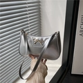 Silver metallic underarm bag with gold bow detail and minimalist shoulder strap design - Silver