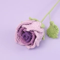 Close-up of handmade crochet rose with purple gradient petals and detailed green leaf knitting - Gradient Purple