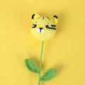 Handmade crochet tiger head flower arrangement with green stem and leaves - Tiger Style