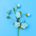Handmade sky blue crochet rose bouquet with knitted petals and green leaves on blue base - Barbie Rose Branch / Gradient Blue