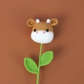 Handmade crochet flower bouquet featuring a cute brown and white cow doll head - Calf Style