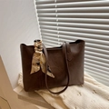 Dark brown retro tote bag with elegant floral scarf detail and textured finish - Brown