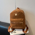 Brown leopard print backpack with gold hardware and smooth faux leather texture - Brown
