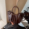 Dark brown pleated cloud bag in oily leather finish with round handle and shoulder strap - Brown