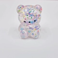 Detail of transparent bear squishy toy filled with colorful star sequins and glitter beads - Starry Sky Dual Color Pearl