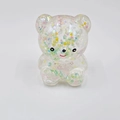 Close-up of bear squeeze toy with colorful glitter stars and pearls inside - Autumn Scent Pearl