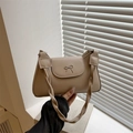 Sac à bandoulière beige chic avec boucle nœud et sangle tissée au style moderne minimaliste - Khaki
