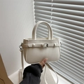 Chic off-white PU leather small crossbody bag with stylish silver buckle details - White