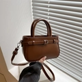 Chic brown minimalist PU leather crossbody bag with elegant top handles and silver buckle - Tan