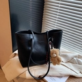 Minimalist black tote bag in textured faux leather with a cute plush bear charm - Single Bag / Black