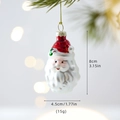 Hand-painted glass Santa Claus ornament with red hat and green holly leaf on a pine branch - Santa Claus