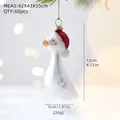 Christmas goose ornament in santa hat with golden string, 12cm height festive decoration - White Goose