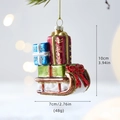 Christmas glass ornament featuring a colorful sleigh stacked with glittery gift boxes - Gift Box