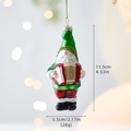 Glass Santa ornament playing accordion with festive green and red finish, 11.5cm height - Santa Claus with Accordion