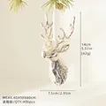Golden reindeer head Christmas tree ornament with elegant metallic finish and hanging string - Champagne Reindeer Head