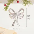 Silver bow Christmas ornament with metallic texture hanging on pine branch, size 12x10cm - Champagne Bow