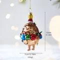 Whimsical glass hedgehog Christmas ornament with festive hat and colorful lights - Hedgehog
