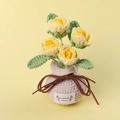 Detail of handmade crochet yellow roses in a cream vase with Handmade WITH LOVE label - Small / Gradient Yellow