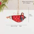 Red Christmas angel tin ornament with white snowflakes and gold halo hanging on twine - Angel Girl B (Red Snowflake Dress)